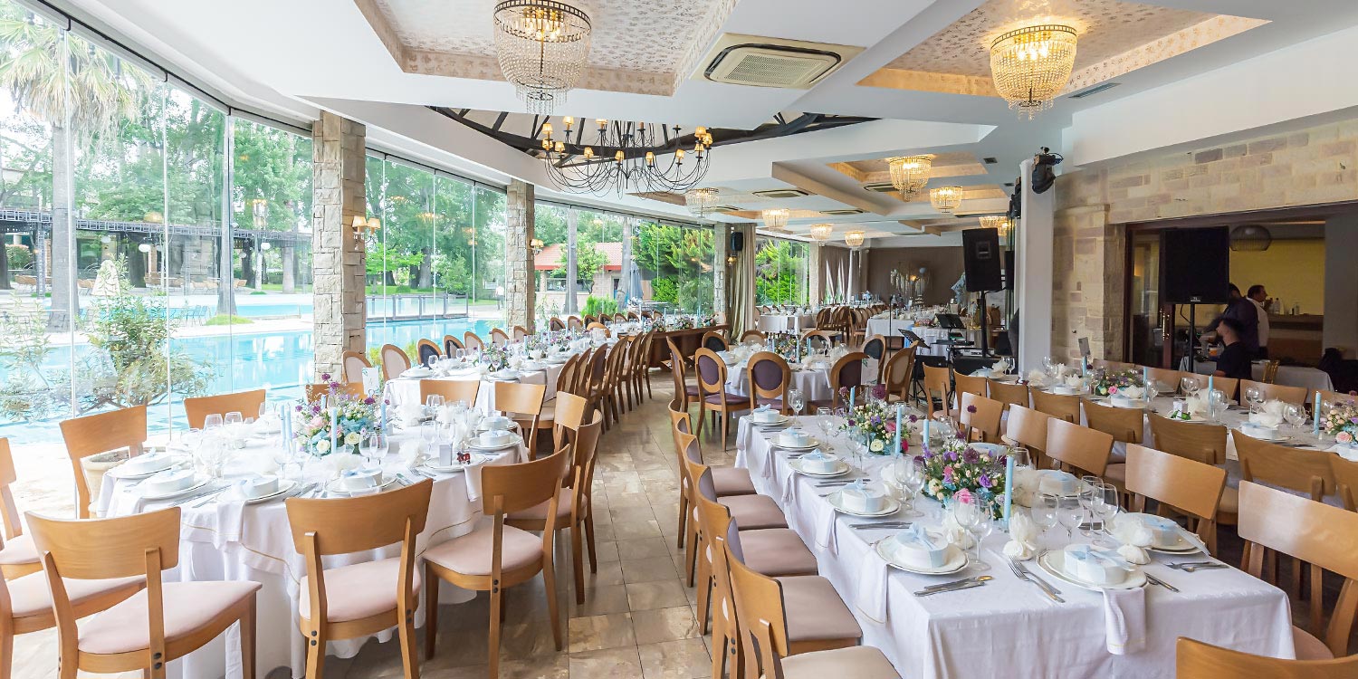 A Signature Wedding & Baptism Production in Blue 15 Wedding at Korali, Agrinio by Rogdaki Events, featuring a modern reception setup, floral compositions, and blue details.
