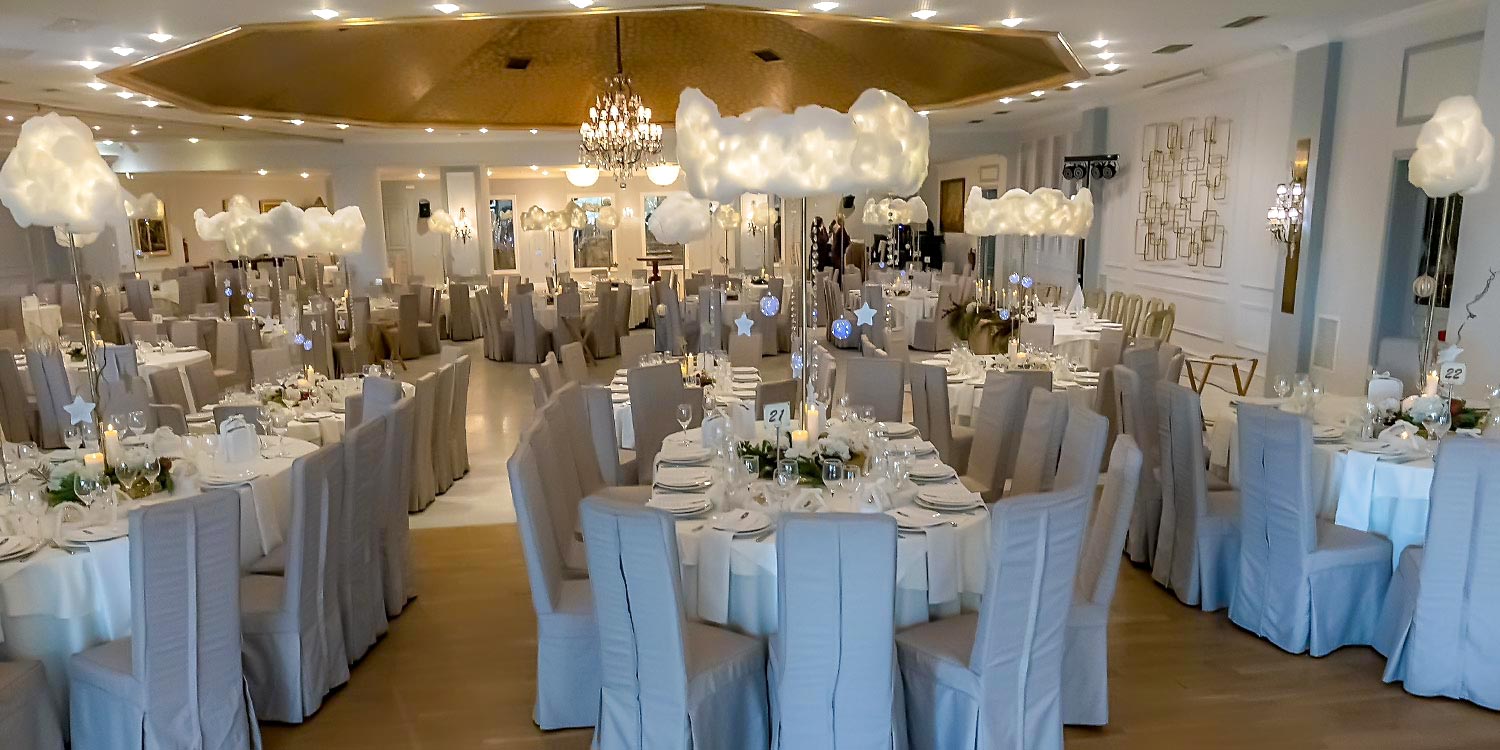 Rogdaki Events Design Christmas Baptism Clouds and Stars, an indoor decoration with white clouds and atmospheric lighting at Pythari.