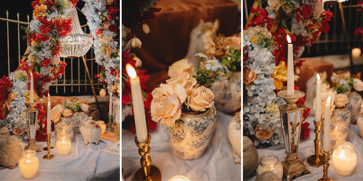 Vintage vases and soft candlelight create a romantic atmosphere for this Rogdaki Events Authentic Village Square Wedding.
