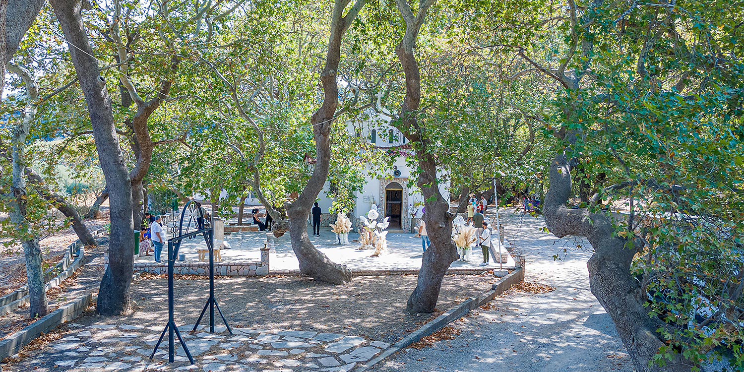 Whimsical Forest Christening with Oversized Floral Decor 16 The enchanting atmosphere of a forest baptism ceremony, organized by Rogdaki Events