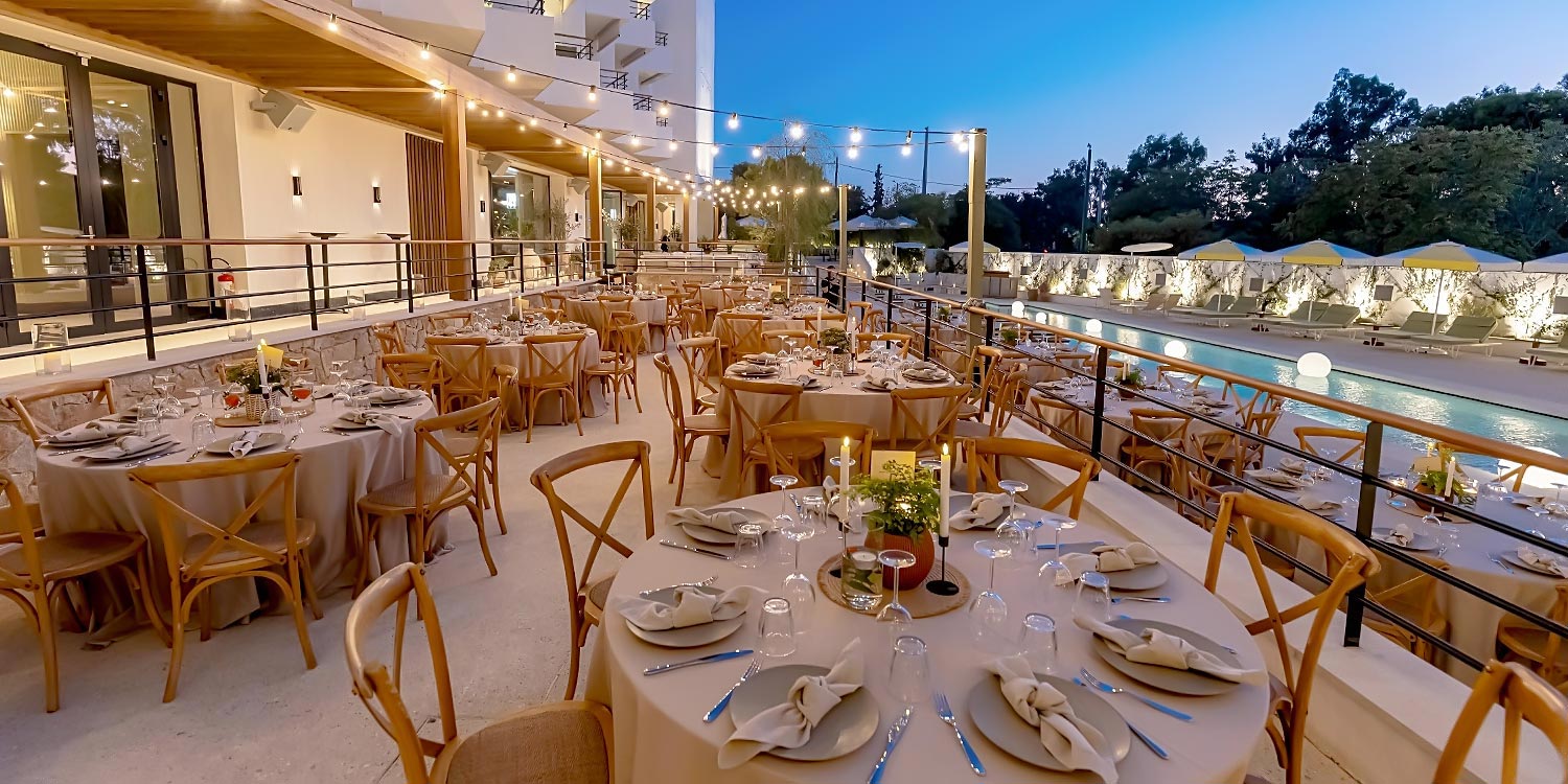 Corporate Design Excellence at Ace Hotel Athens 24 Warm evening lighting and architectural integration for a corporate gathering at the Athens Riviera by Rogdaki Events Design.