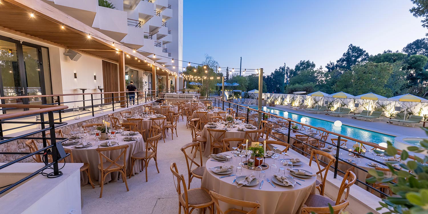 Corporate dinner setup on the terrace of Ace Hotel Athens by Rogdaki Events Design in Glyfada.