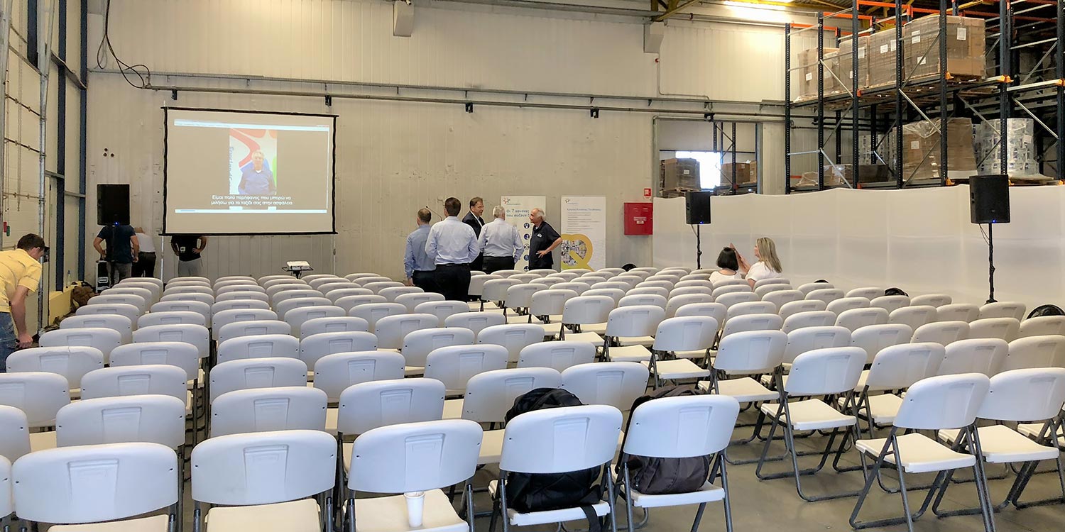 Friesland Campina Hellas: 2,000 Days of Safety at the NOUNOU Factory 8 Διαμόρφωση σκηνής και χώρου ομιλιών από τη Rogdaki Events για τις ανάγκες του corporate event στο εργοστάσιο ΝΟΥΝΟΥ