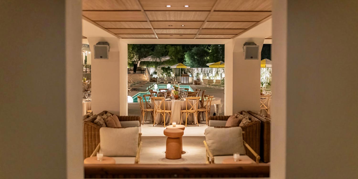 Evening view of a corporate gala on the Athens Riviera with full styling by Rogdaki Events Design.