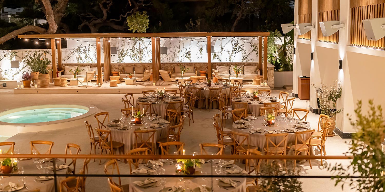 Outdoor corporate event setup in Glyfada with the design signature of Rogdaki Events Design.