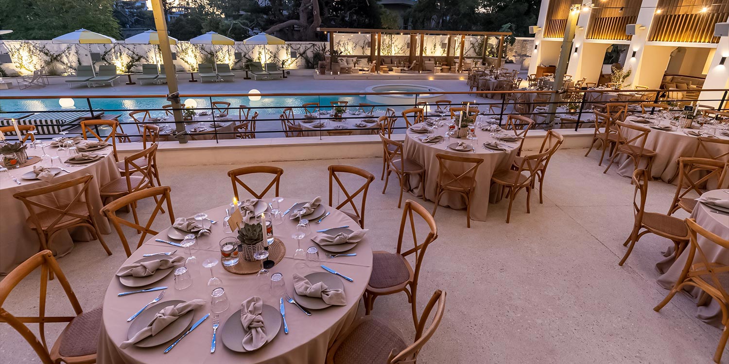 Table layout for a corporate dinner at the Ace Hotel Athens outdoor venue by Rogdaki Events Design.