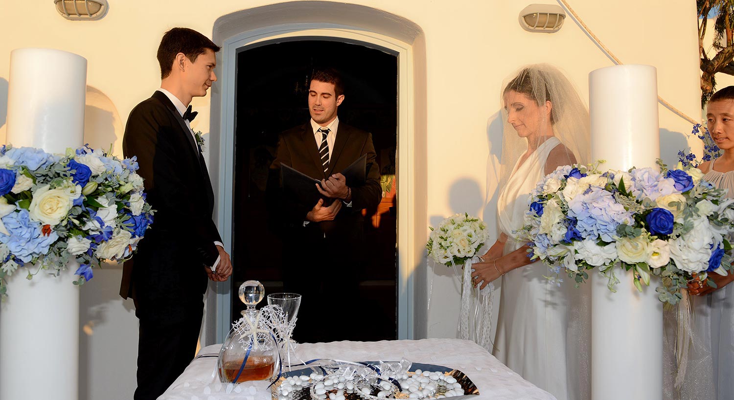 Mykonos | Japanese-Romanian Destination Wedding 20 A lovely ceremony at a Japanese Romanian wedding in Mykonos' Saint John resort, coordinated by Rogdaki Events