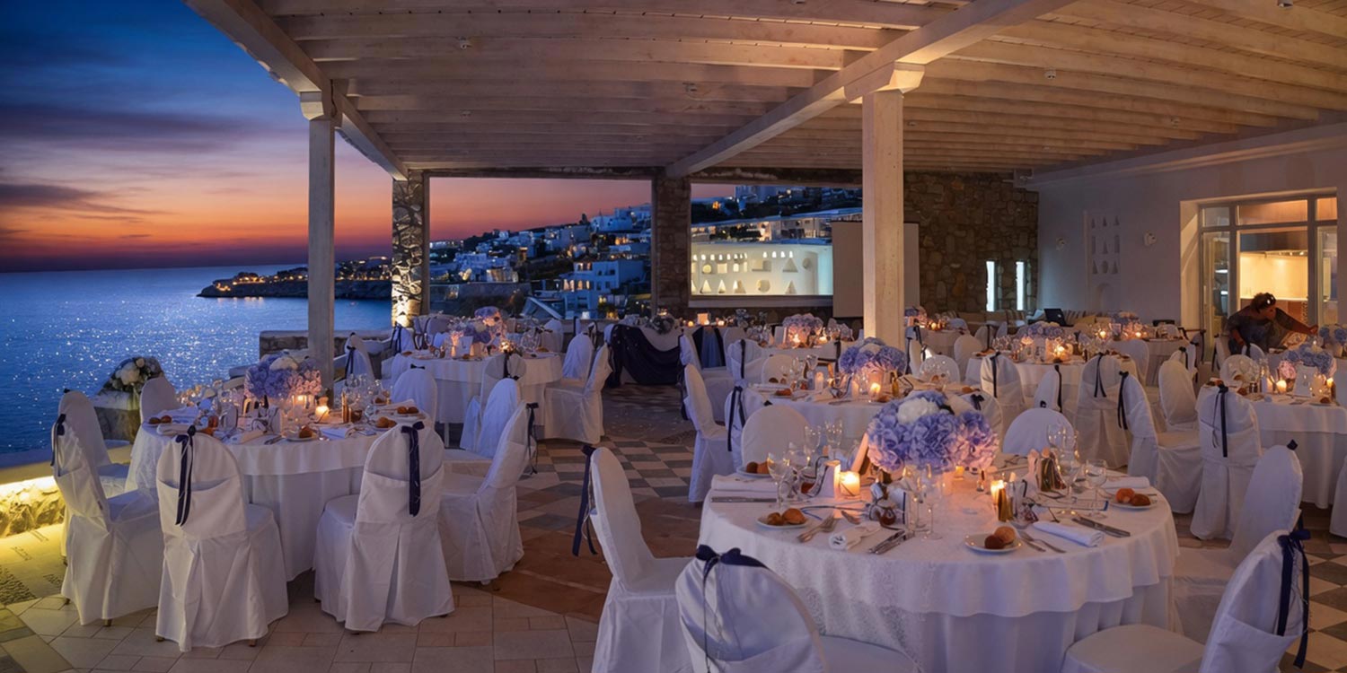 Mykonos | Japanese-Romanian Destination Wedding 29 An exquisite dinner setup for a Japanese Romanian wedding at Saint John resort in Mykonos, crafted by Rogdaki Events